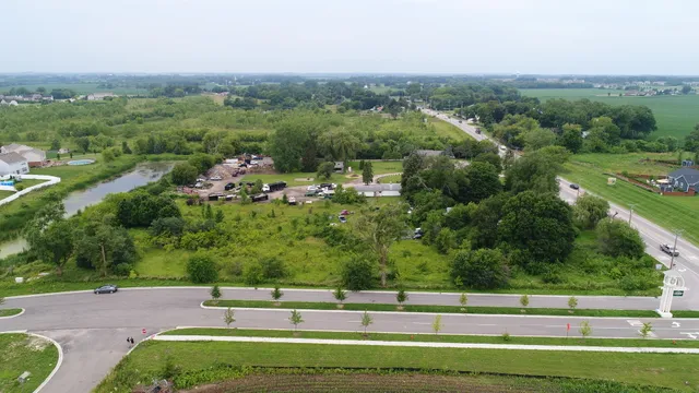 an aerial view of a yard with houses