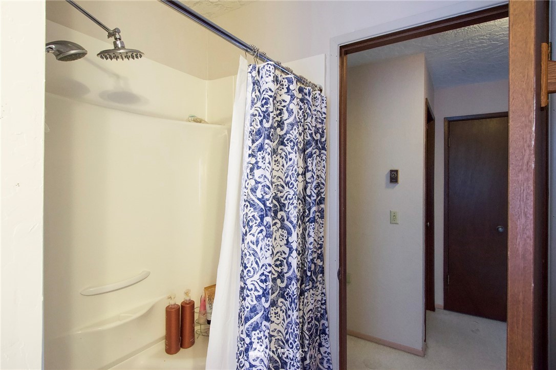 1493 Atterberry Road Sequim, WA 98382 - Photo 26 of 40 a bathroom with a shower and a sink