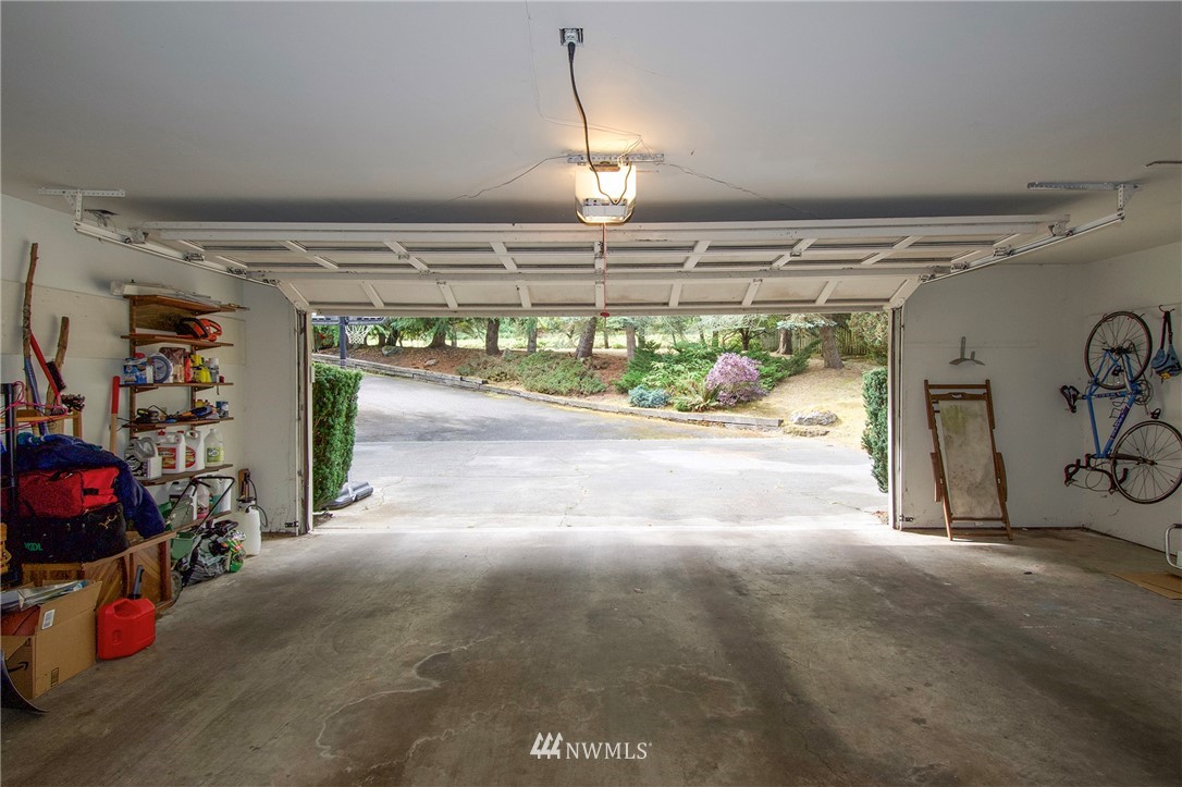 1493 Atterberry Road Sequim, WA 98382 - Photo 33 of 40 a view of a garage with storage