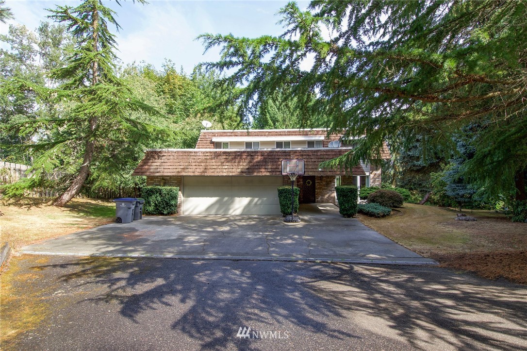 1493 Atterberry Road Sequim, WA 98382 - Photo 34 of 40 a view of a house with a tree
