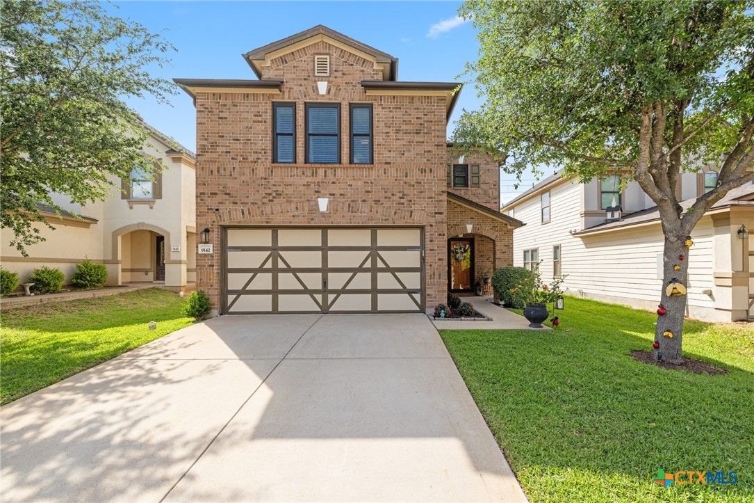 9142 Sage Loop Court Temple, TX 76502 - Photo 1 of 27 front view of a house with a yard