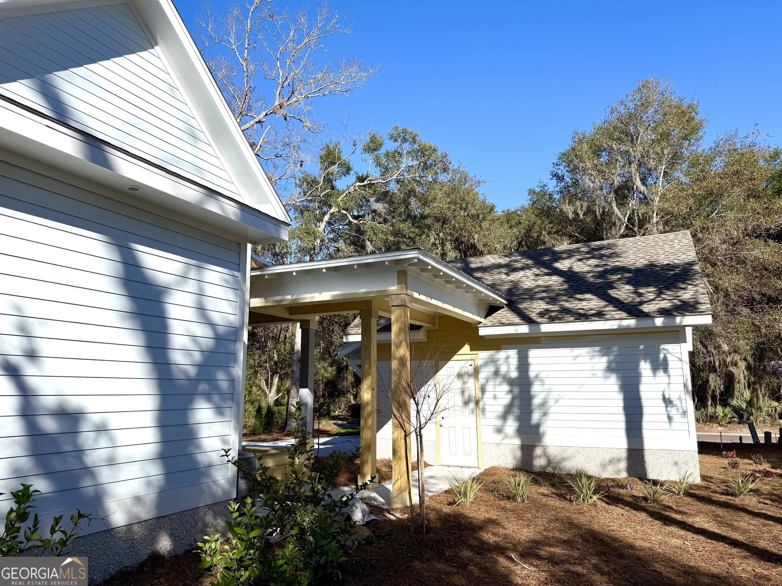 308 Anchor Way St. Marys, GA 31558 - Photo 19 of 55 a front view of a house with a yard