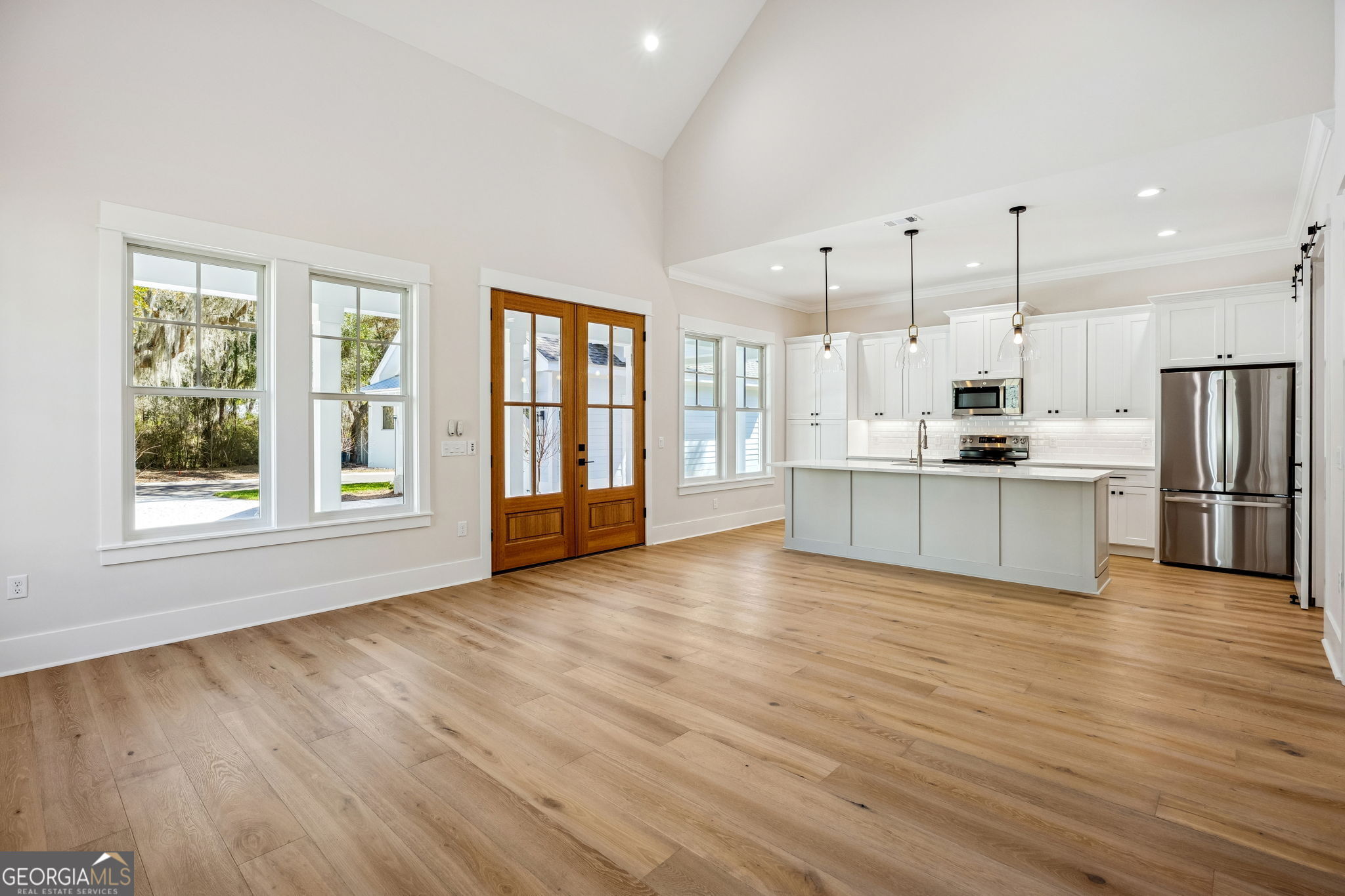 308 Anchor Way St. Marys, GA 31558 - Photo 20 of 55 a view of kitchen with wooden floor and window