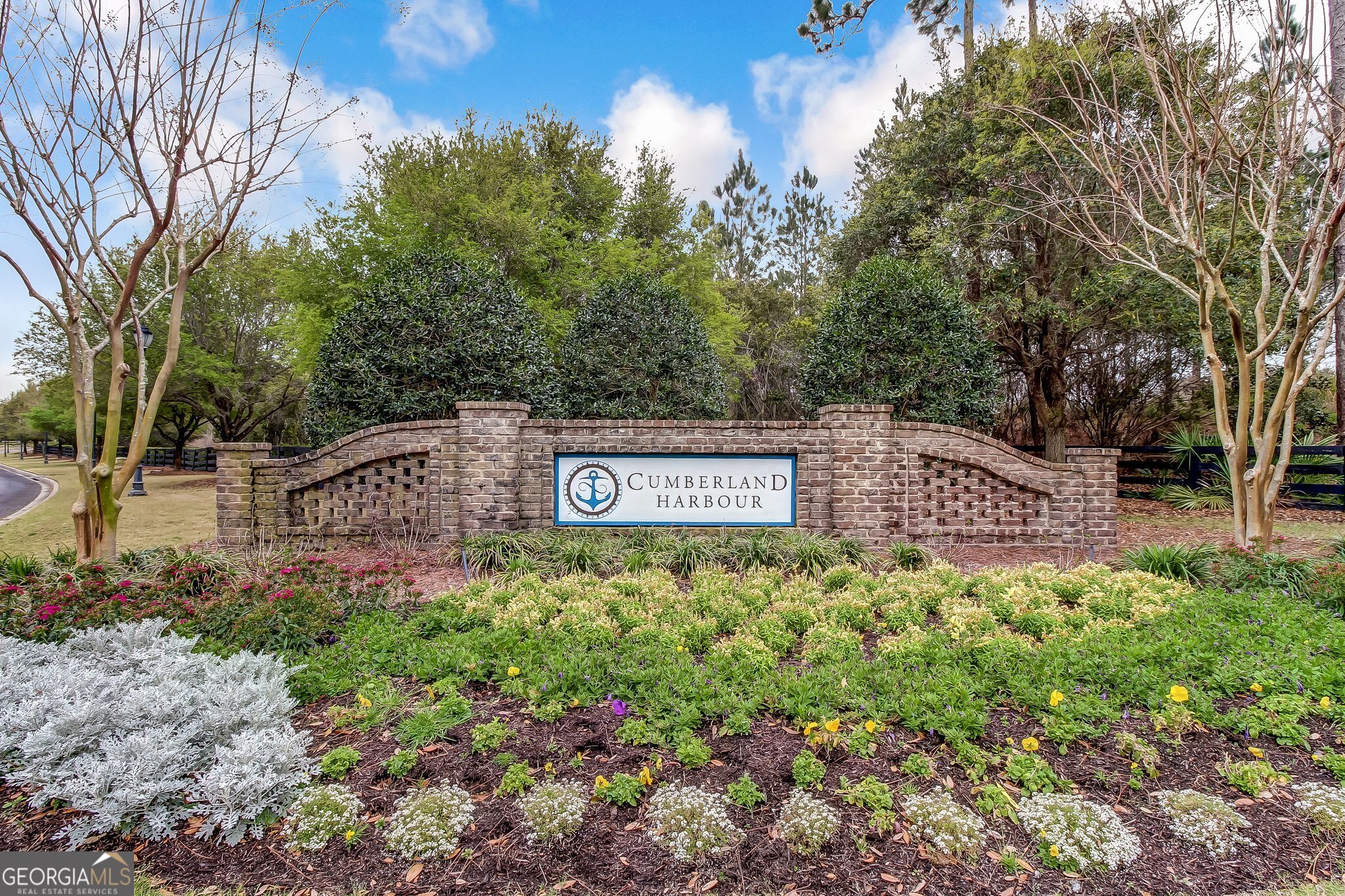 308 Anchor Way St. Marys, GA 31558 - Photo 29 of 55 a sign that is sitting in front of a tree