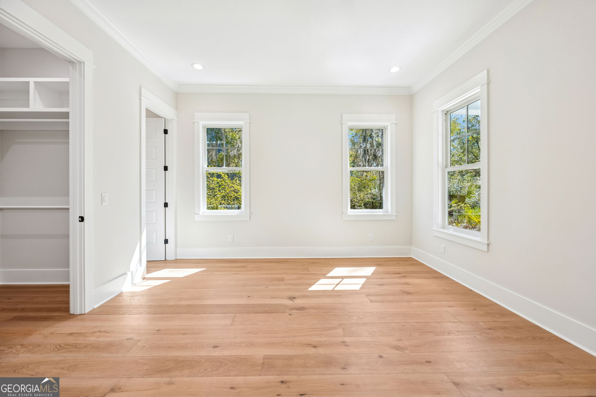 308 Anchor Way St. Marys, GA 31558 - Photo 30 of 55 an empty room with wooden floor and windows