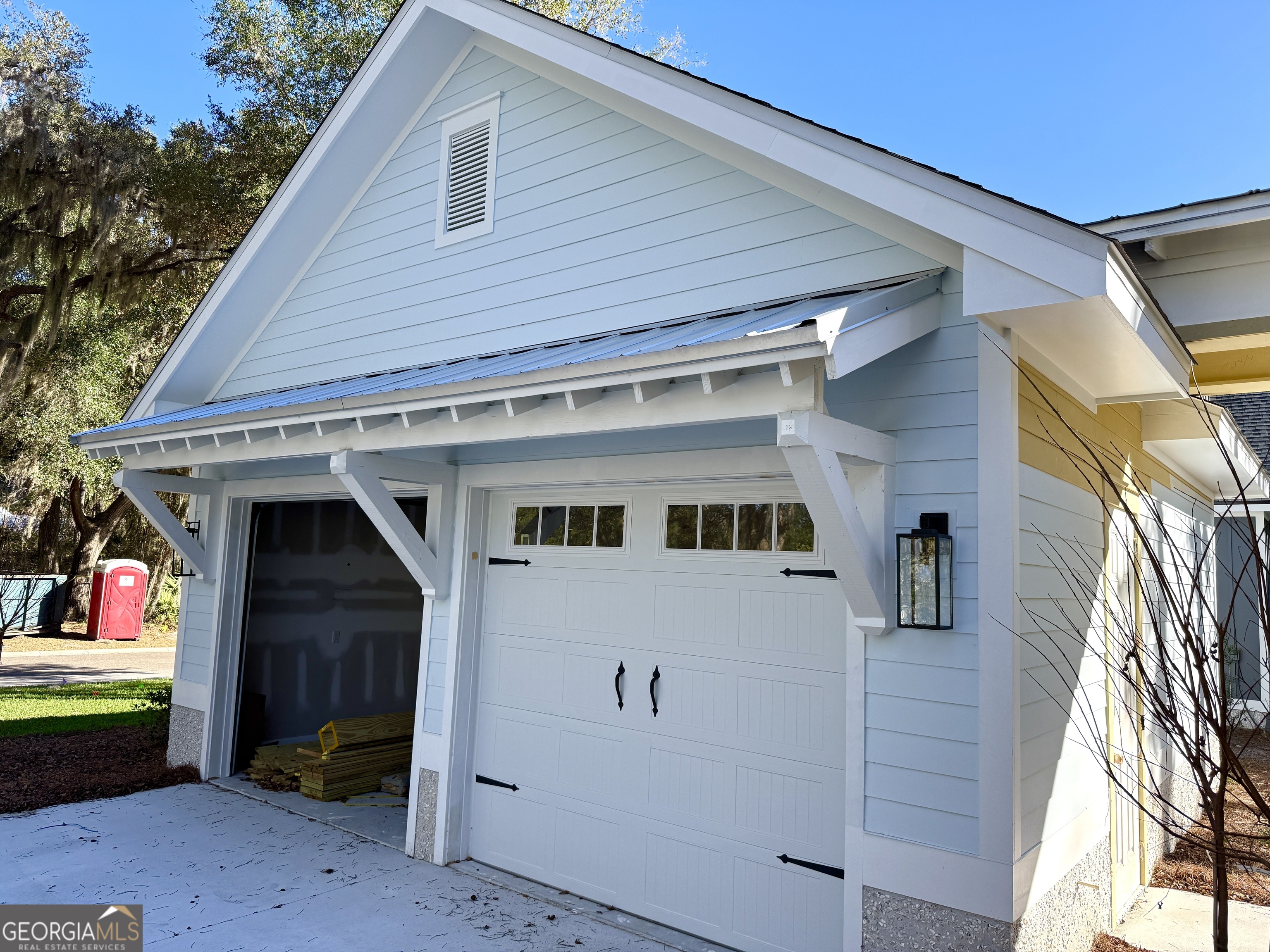 308 Anchor Way St. Marys, GA 31558 - Photo 3 of 55 a view of a house with a garage