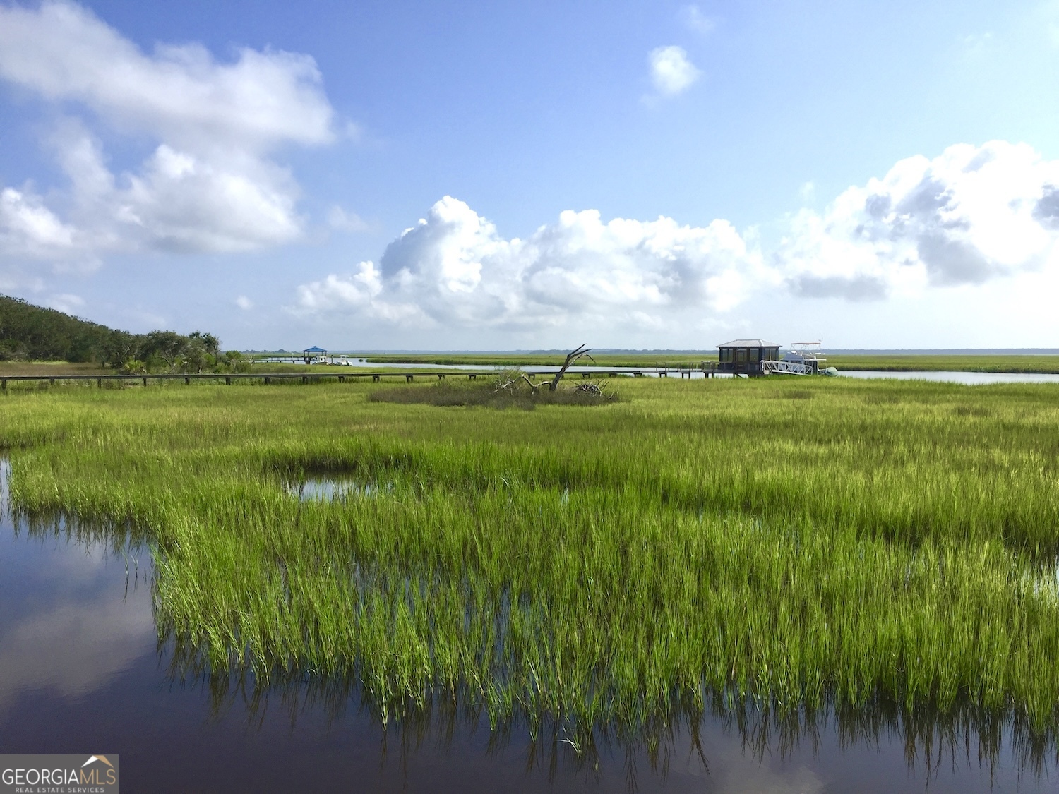 308 Anchor Way St. Marys, GA 31558 - Photo 35 of 55 a view of an lake and a yard