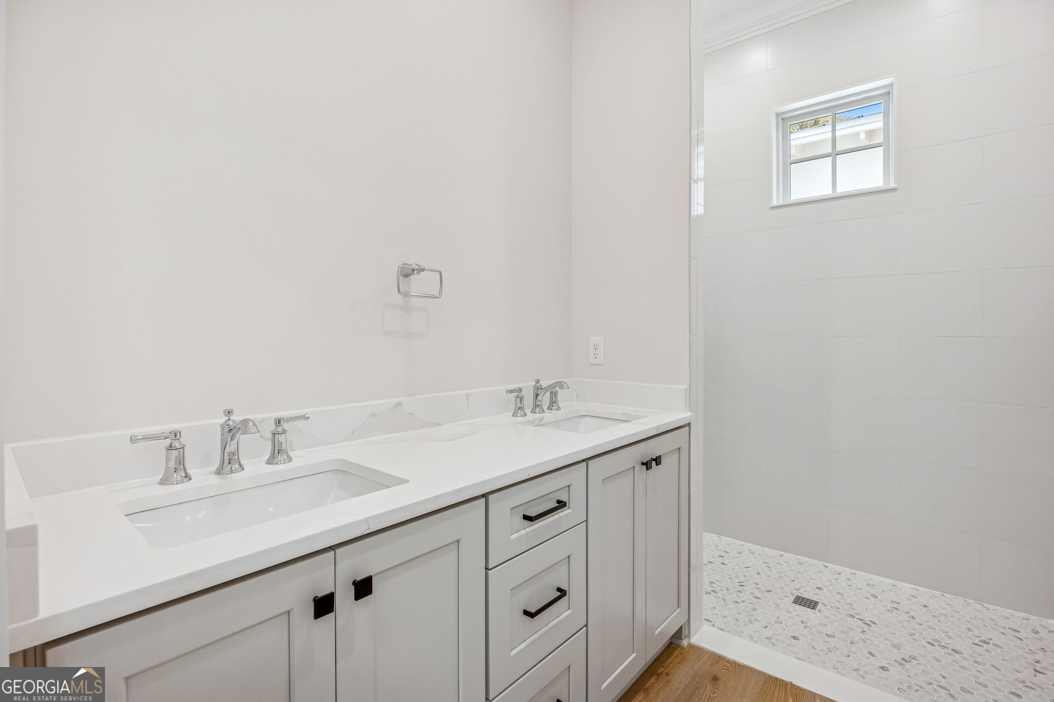 308 Anchor Way St. Marys, GA 31558 - Photo 40 of 55 a bathroom with a sink and a mirror
