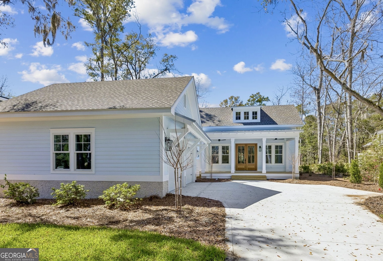 308 Anchor Way St. Marys, GA 31558 - Photo 4 of 55 a front view of a house with a yard