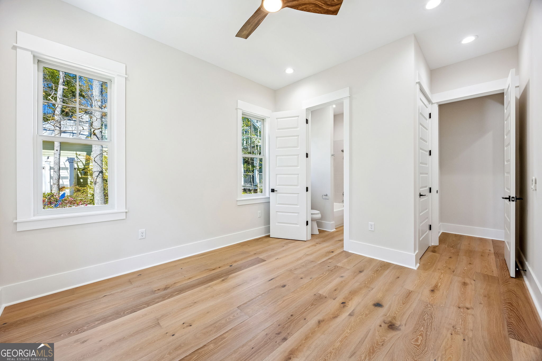 308 Anchor Way St. Marys, GA 31558 - Photo 45 of 55 wooden floor in an empty room with a window