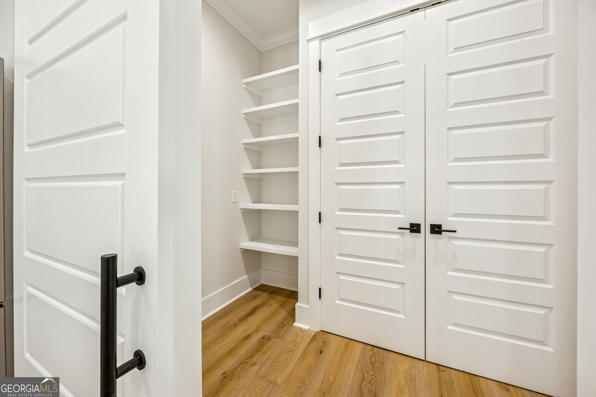 308 Anchor Way St. Marys, GA 31558 - Photo 48 of 55 a view of a room with storage and racks on wall