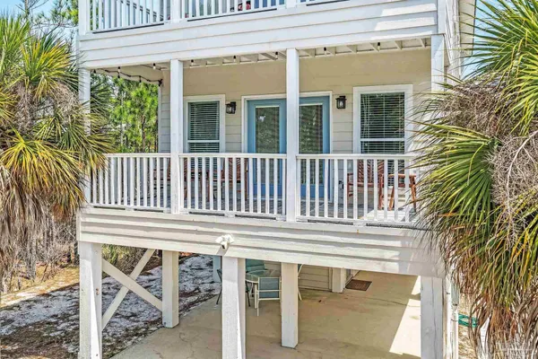 a view of a house with a porch