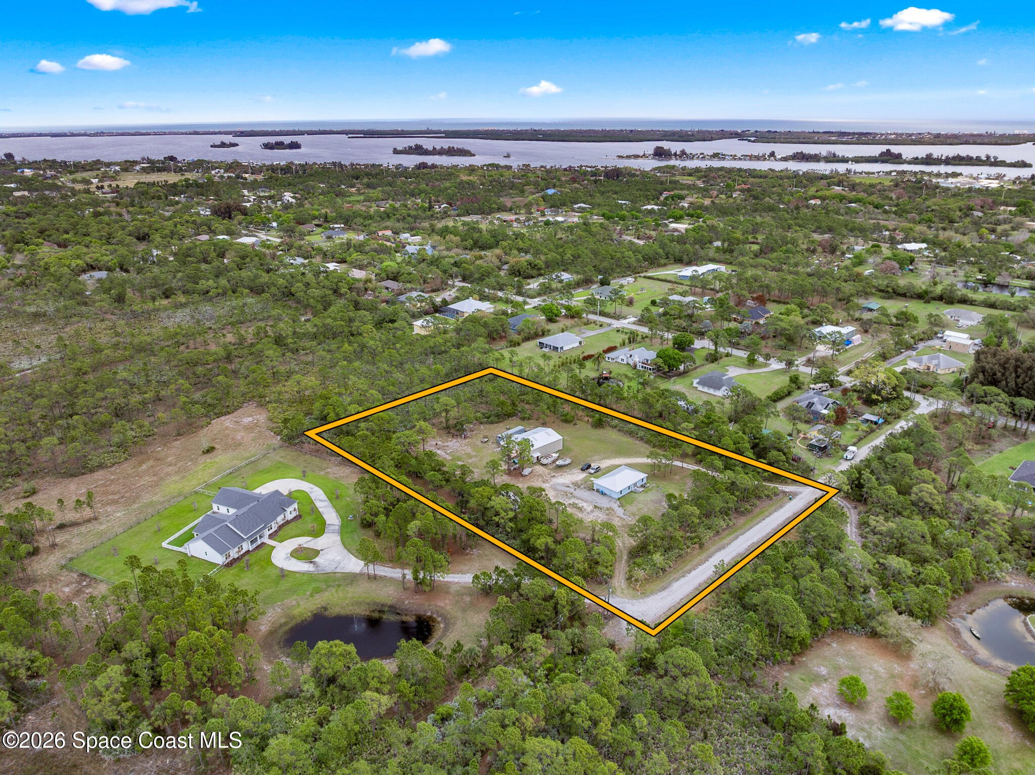 4310 Sand Point Road Grant Valkaria, FL 32949 - Photo 50 of 50 a view of a tennis court