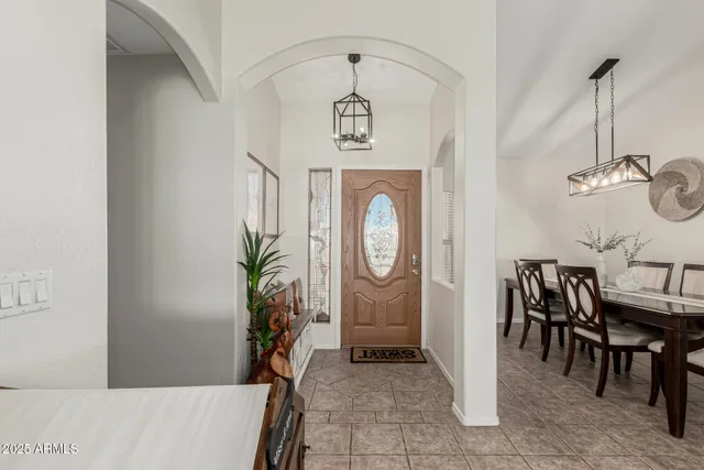 a view of a hallway with seating area
