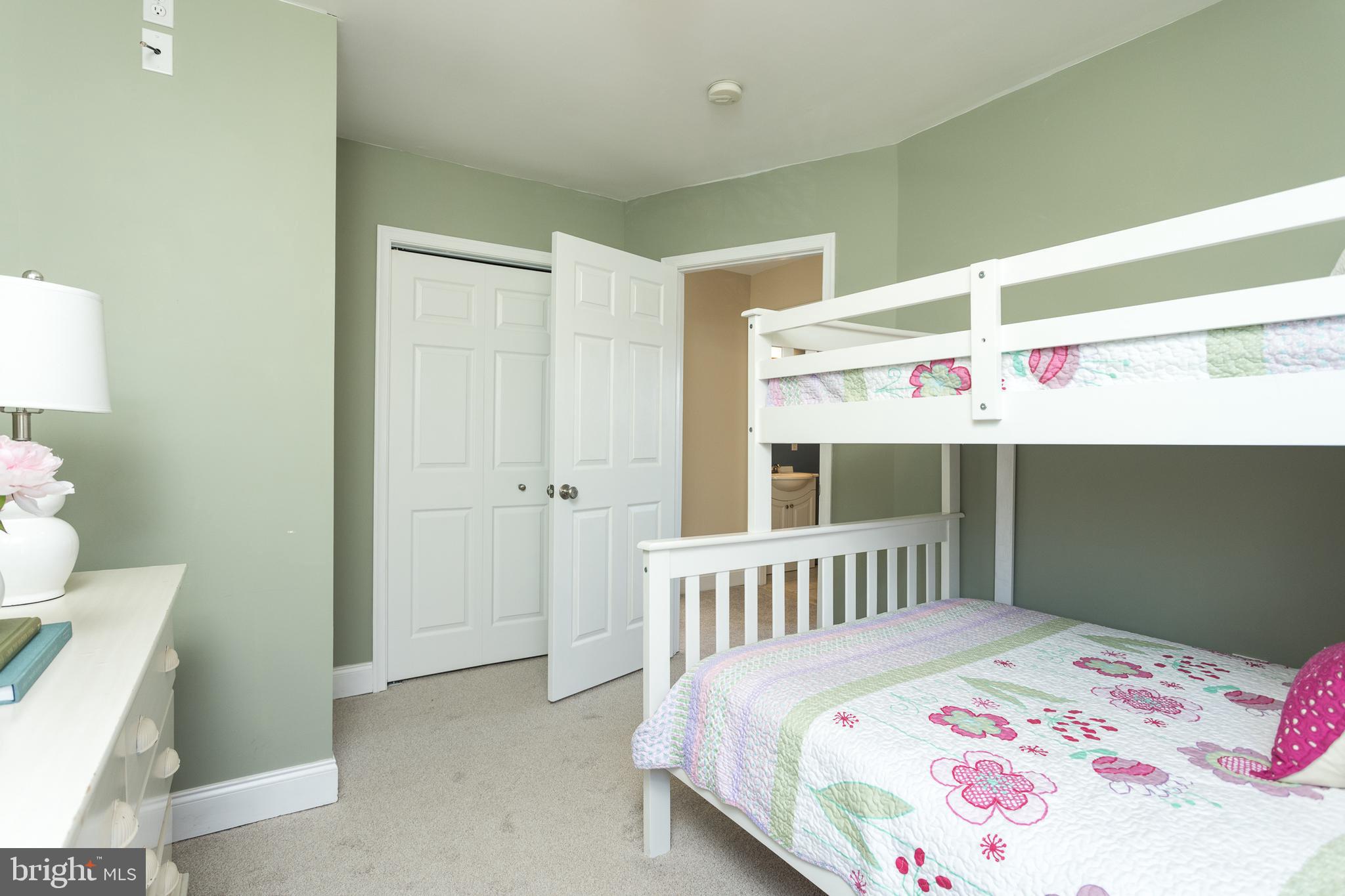 11104 Bird River Grove Road White Marsh, MD 21162 - Photo 18 of 48 a bedroom with a bed and a window