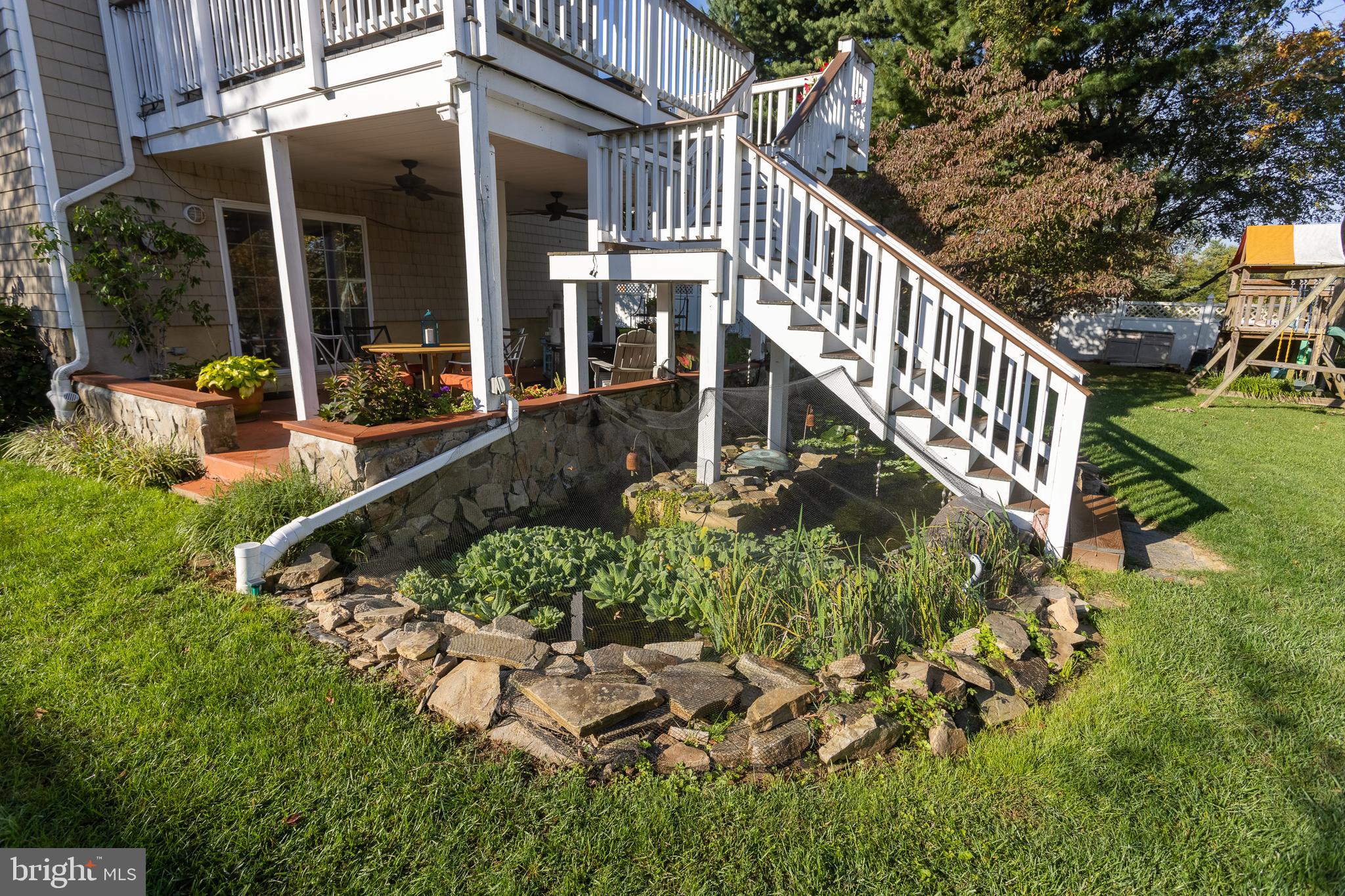 11104 Bird River Grove Road White Marsh, MD 21162 - Photo 34 of 48 a view of a house with backyard and sitting area