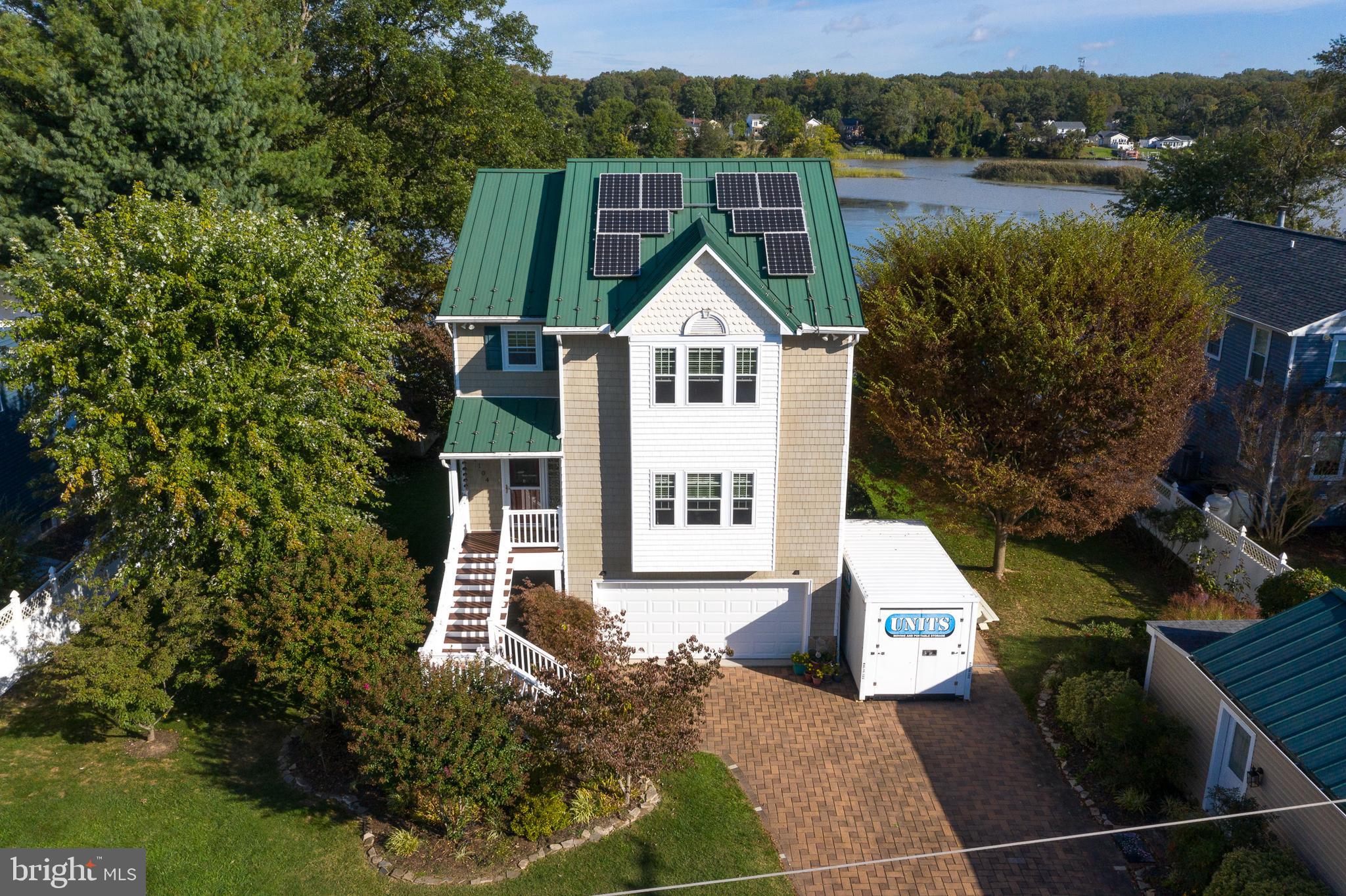 11104 Bird River Grove Road White Marsh, MD 21162 - Photo 39 of 48 a house view with a garden space