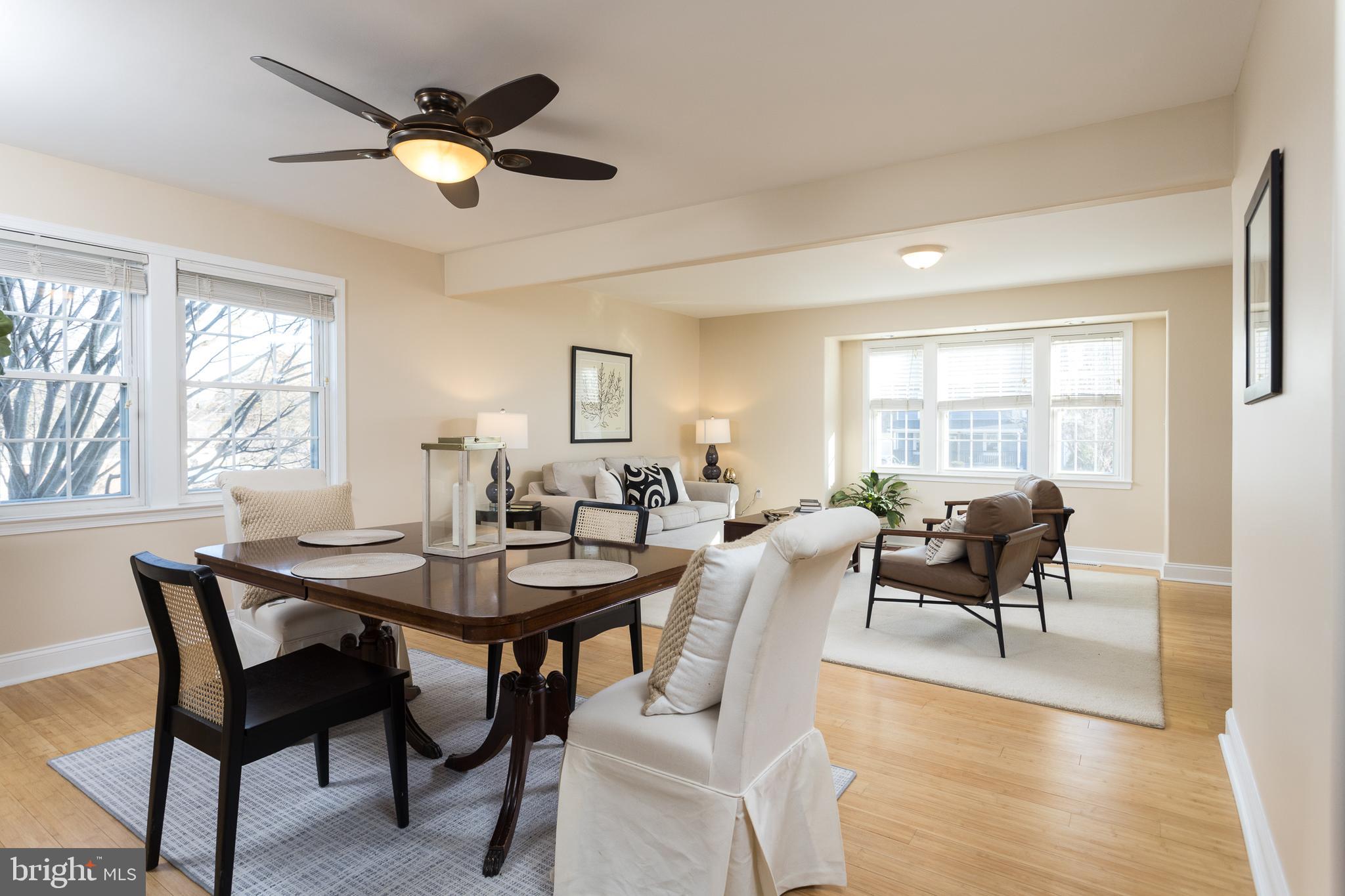 11104 Bird River Grove Road White Marsh, MD 21162 - Photo 10 of 48 a view of a dining room with furniture and wooden floor