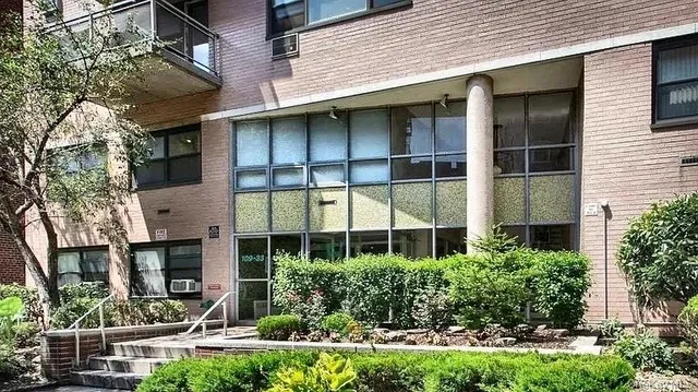 a house view with a garden space