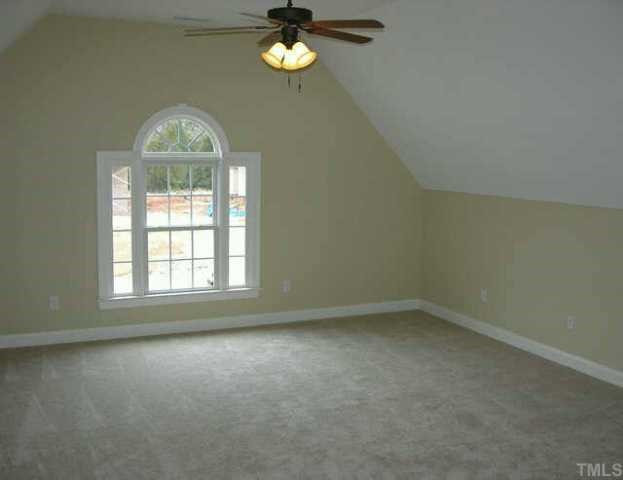 3313 Cotton Road Raleigh, NC 27601 - Photo 9 of 10 Huge bonus room with high ceiling, large arched window and ceiling fan is excellent entertainment space. Other