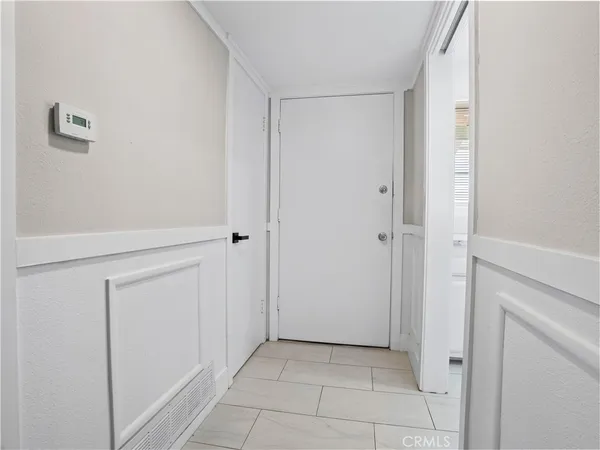 a view of a closet area with hallway