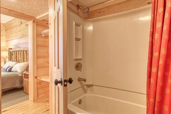 a bathroom with a sink and mirror