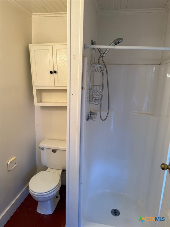 606 West Forrest Street Victoria, TX 77901 - Photo 11 of 15 a bathroom with a toilet and a shower