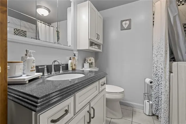 a kitchen with stainless steel appliances a sink and cabinets