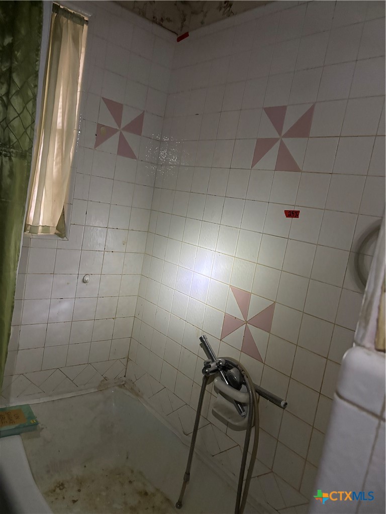 350 Grand Street Placedo, TX 77977 - Photo 12 of 15 a bathroom with a shower