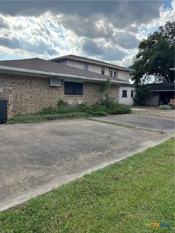 a front view of house with yard