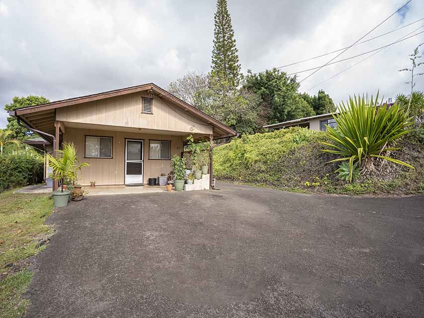 507 Lower Kimo Drive Kula, HI 96790 - Photo 16 of 30 a view of a house with a yard and garage