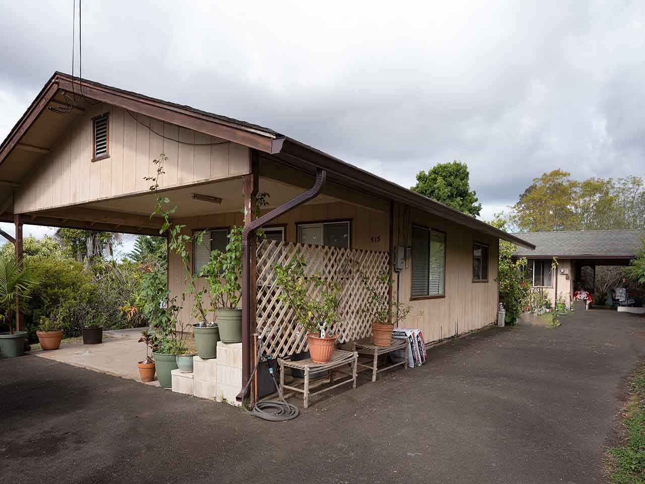 507 Lower Kimo Drive Kula, HI 96790 - Photo 17 of 30 a view of patio with a table and chairs under an umbrella