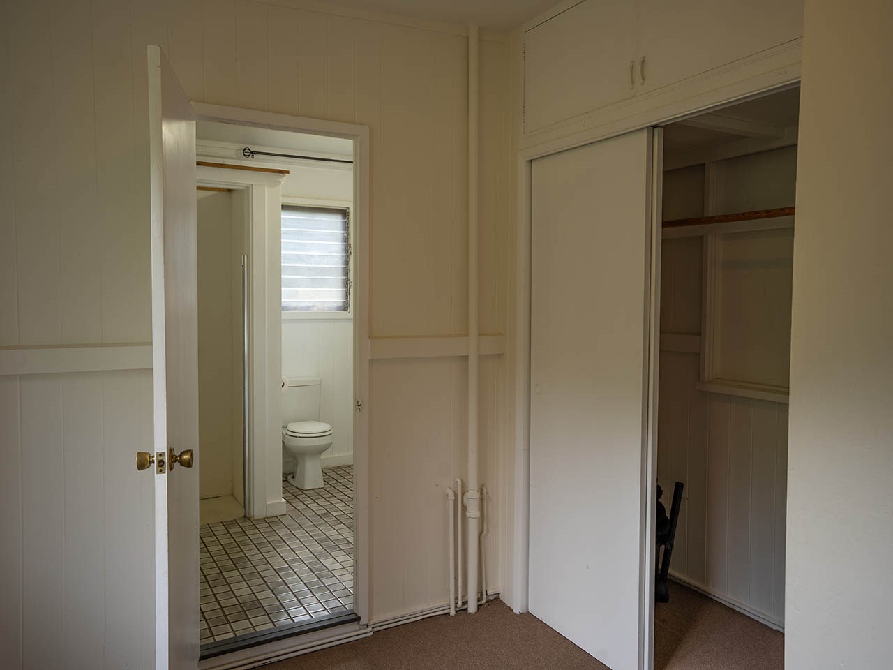 507 Lower Kimo Drive Kula, HI 96790 - Photo 21 of 30 a bathroom with a toilet and a sink