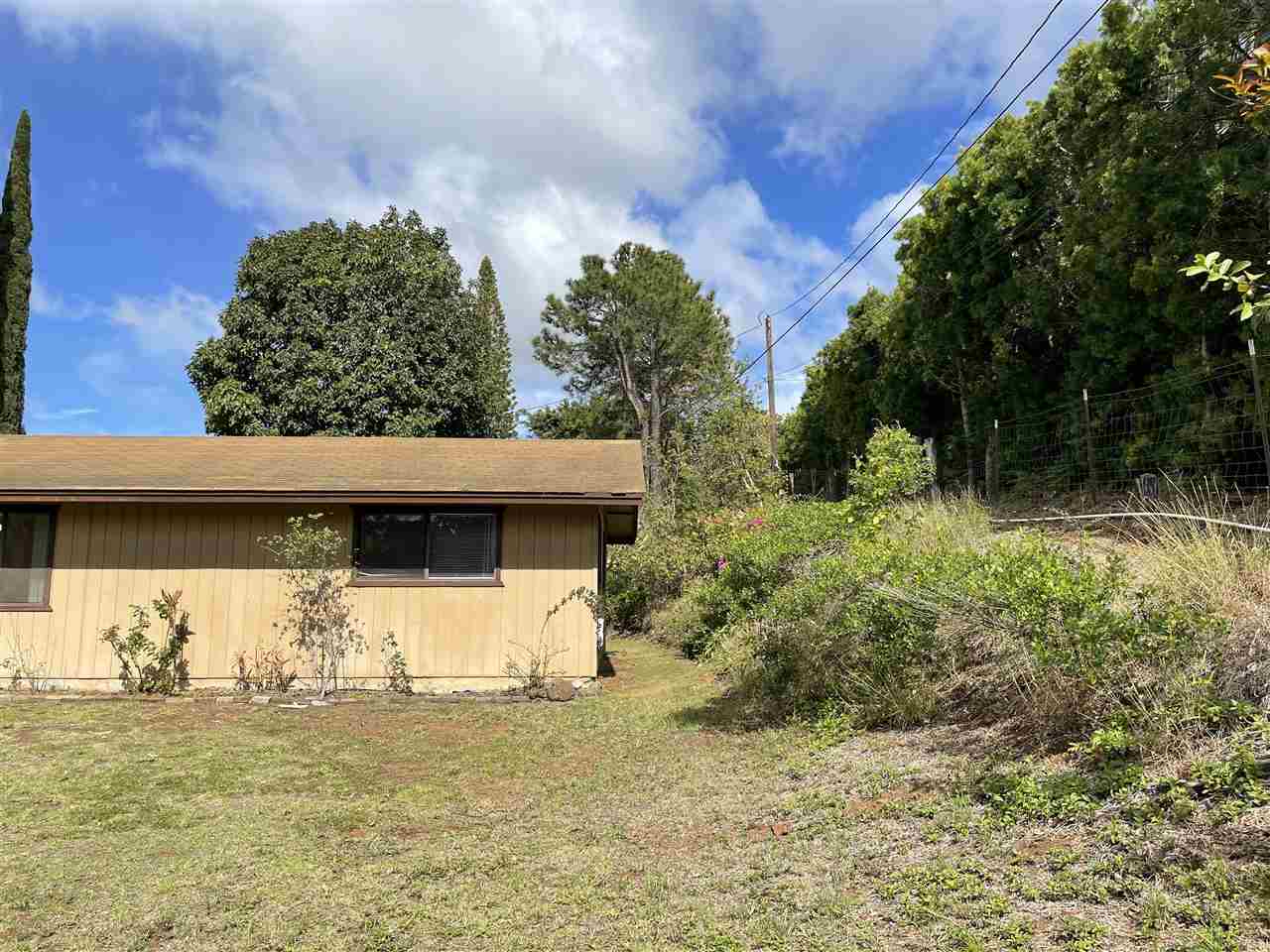 507 Lower Kimo Drive Kula, HI 96790 - Photo 26 of 30 a front view of a house with garden