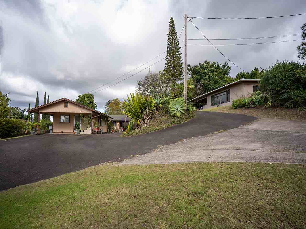 507 Lower Kimo Drive Kula, HI 96790 - Photo 7 of 30 a front view of a house with garden