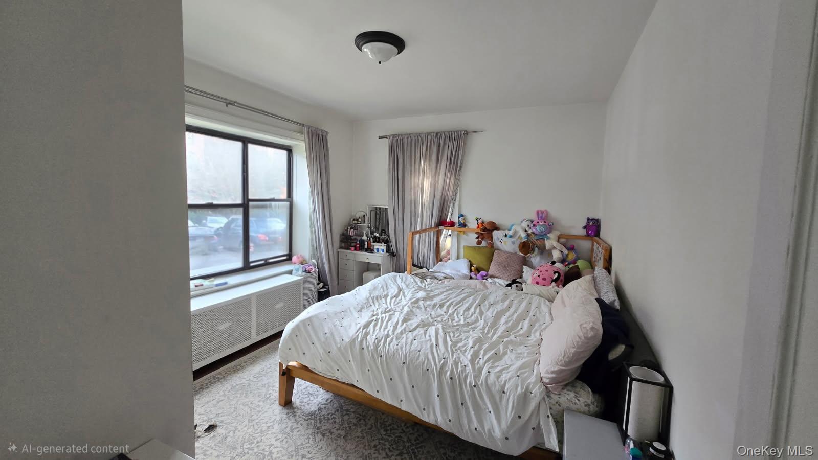 143 Garth Road, Unit 1J Scarsdale, NY 10583 - Photo 15 of 24 a bedroom with a bed and a window