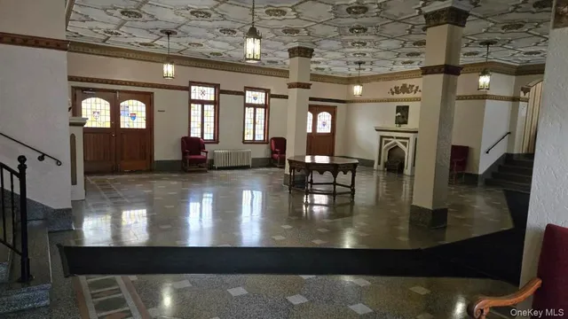 a view of a living room and dining room