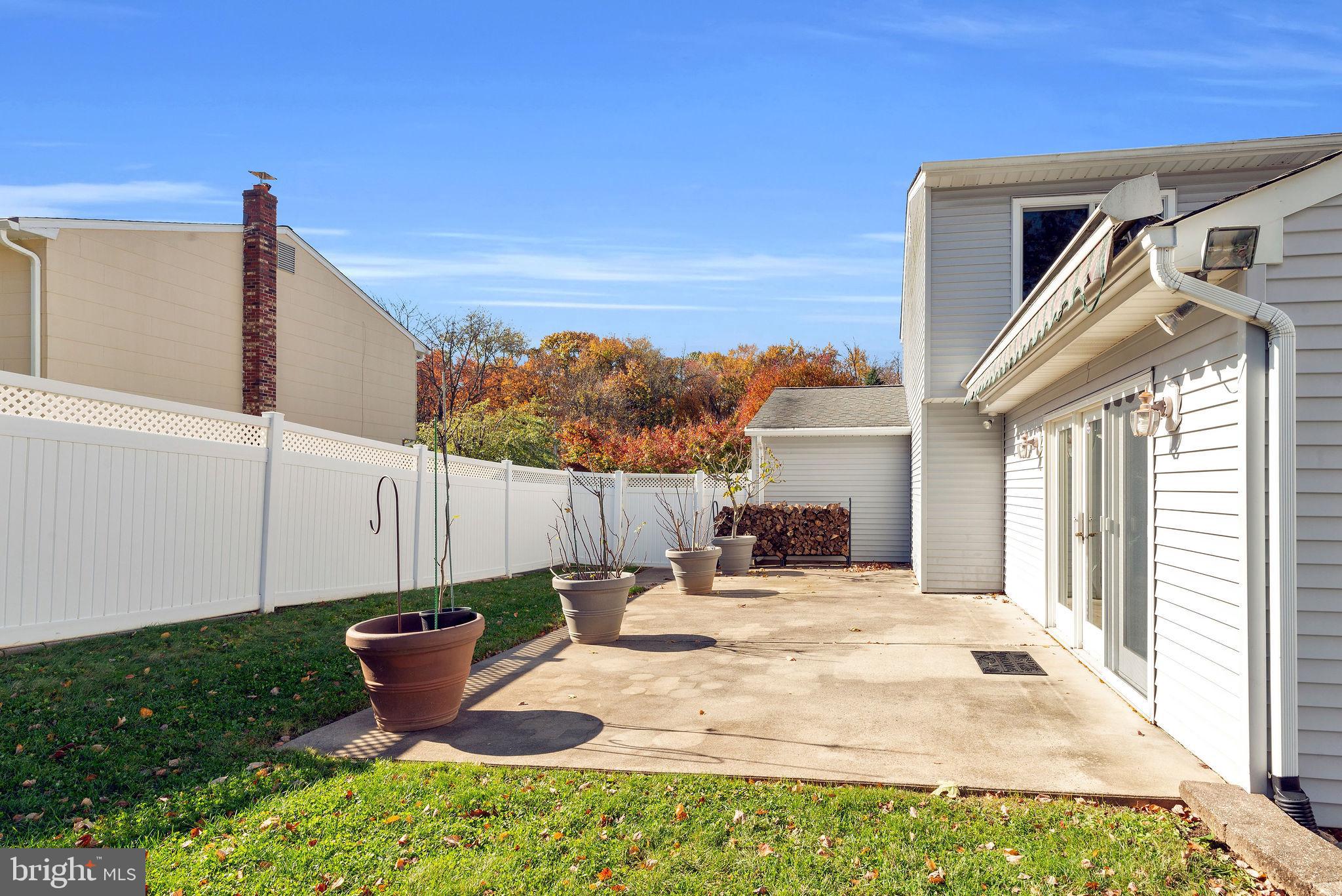 57 Colleen Circle Ewing, NJ 08638 - Photo 31 of 36 Patio off of Great Room with Retractable awning