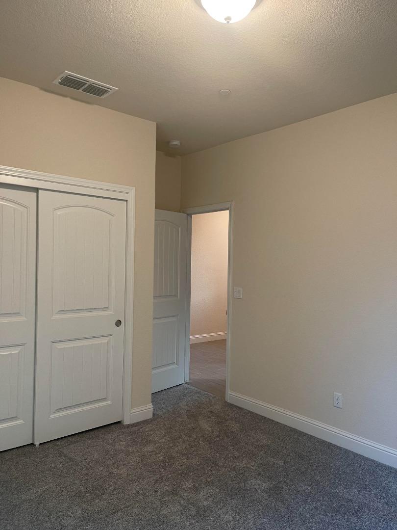 2411 Gabriel Drive Merced, CA 95340 - Photo 18 of 22 an empty room with closet area