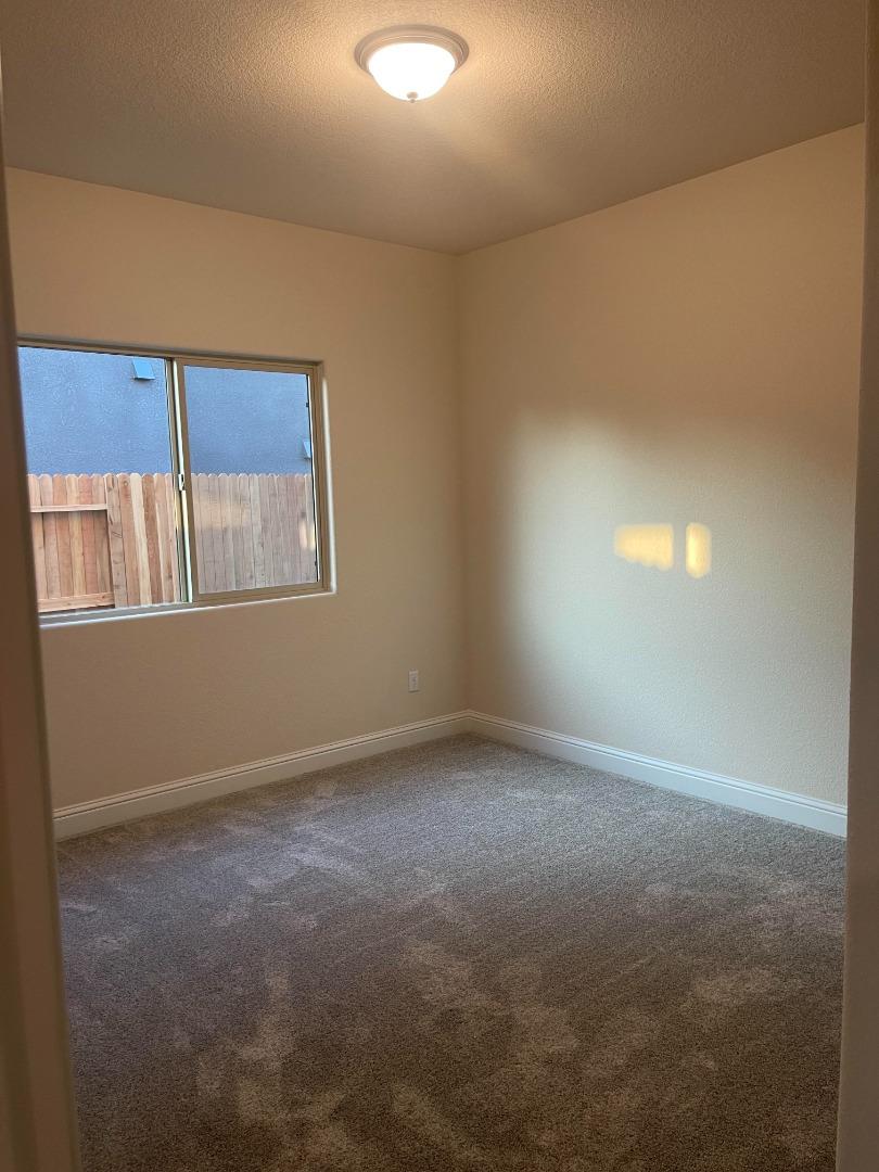 2411 Gabriel Drive Merced, CA 95340 - Photo 19 of 22 an empty room with a window