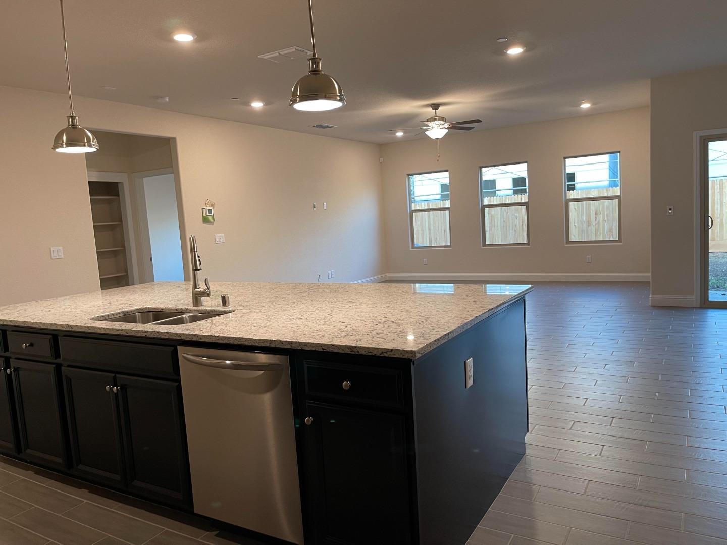 2411 Gabriel Drive Merced, CA 95340 - Photo 7 of 22 a bathroom with a sink and a mirror