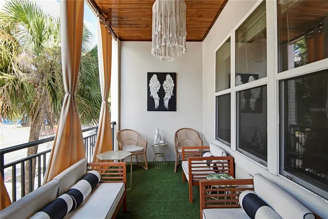a view of a porch with furniture
