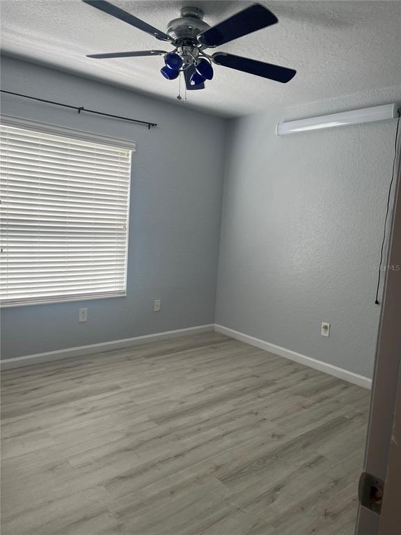 4943 Southwest 41st Place Ocala, FL 34474 - Photo 16 of 30 a view of an empty room with a window
