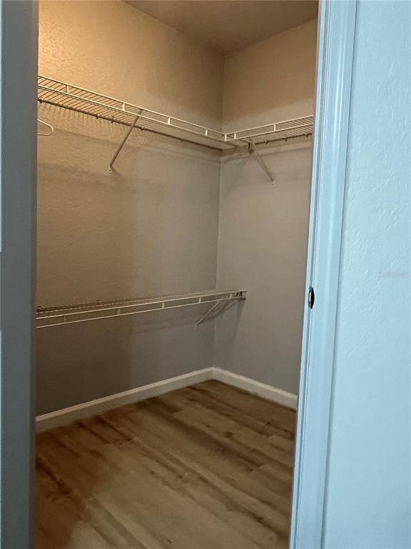 4943 Southwest 41st Place Ocala, FL 34474 - Photo 18 of 30 a view of a room with racks on the wall