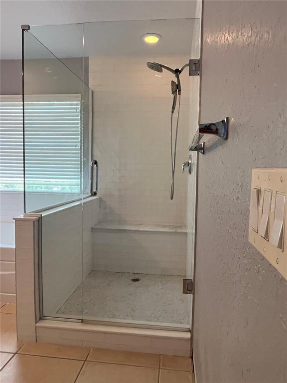 4943 Southwest 41st Place Ocala, FL 34474 - Photo 20 of 30 a bathroom with a shower