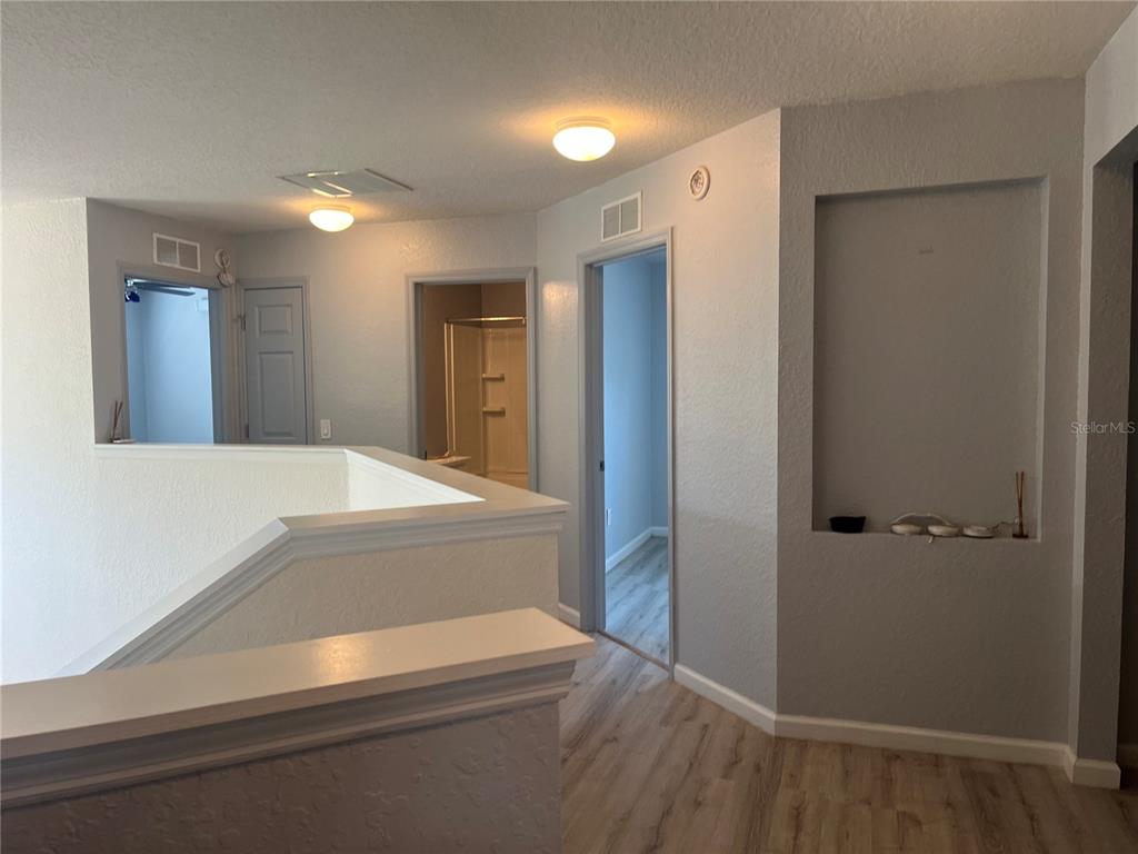 4943 Southwest 41st Place Ocala, FL 34474 - Photo 27 of 30 a bathroom with a sink and a mirror