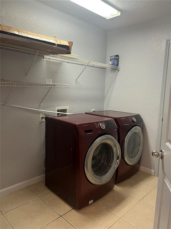 4943 Southwest 41st Place Ocala, FL 34474 - Photo 28 of 30 a close up view of washer and dryer