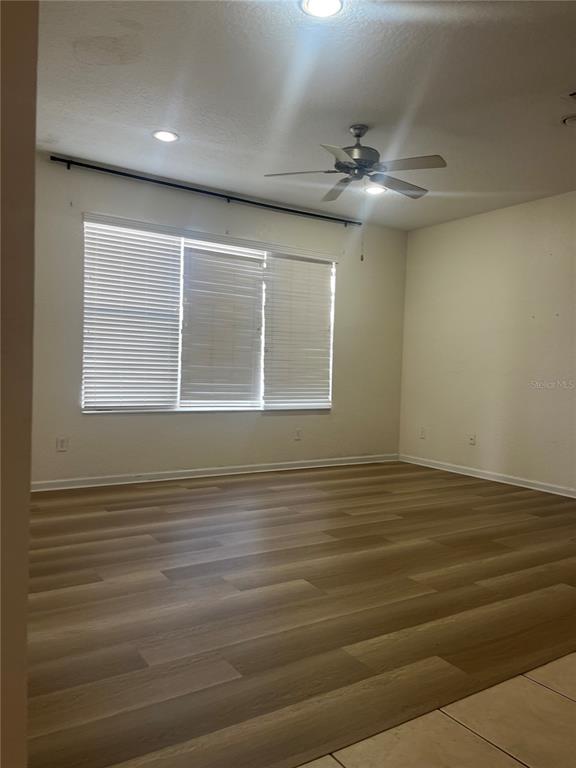 4943 Southwest 41st Place Ocala, FL 34474 - Photo 10 of 30 a view of an empty room with a window