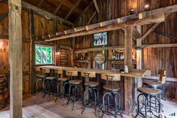a dinning table and chairs in a room