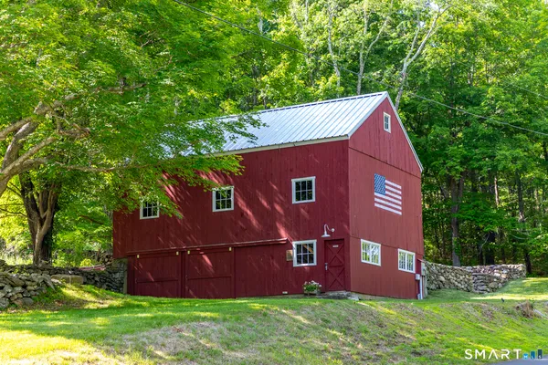 a view of front of a house with a yard